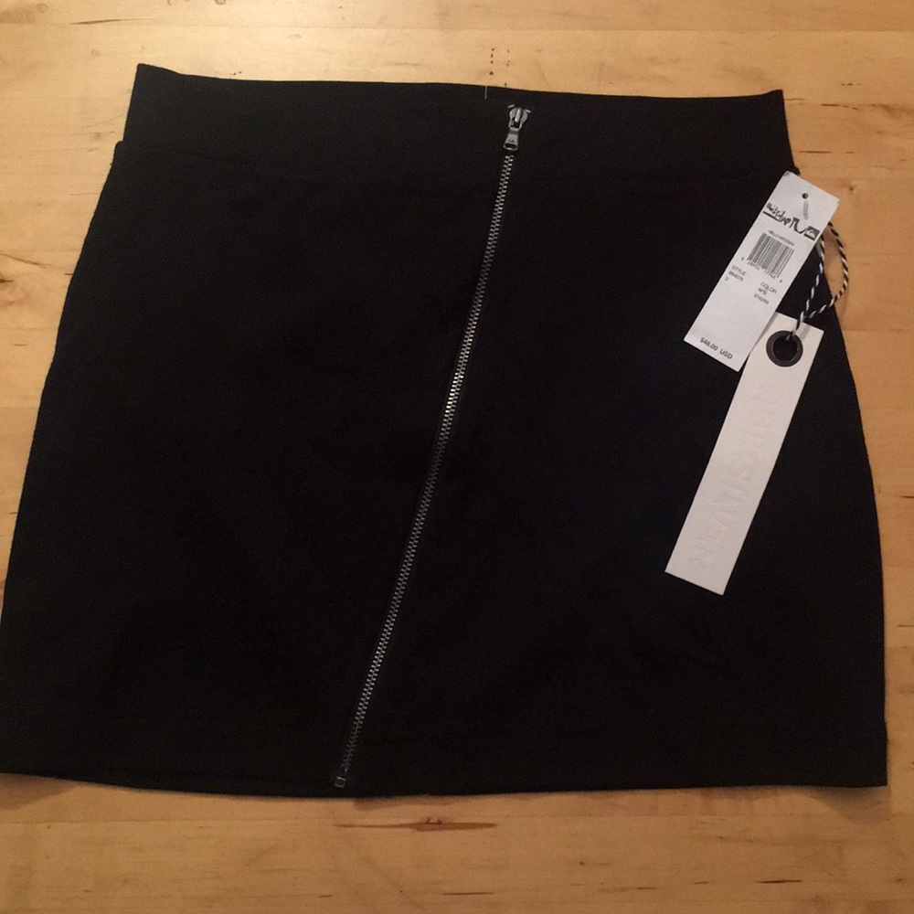 With tags! Cute Quicksilver black mini skirt!